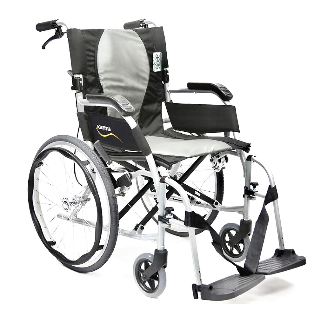The Karman Ergo Flight Ultra Lightweight Ergonomic Wheelchair features large rear wheels, small front casters, armrests, footrests, and a black and gray fabric seat back with a discreet label. Its sturdy metal frame ensures long-term mobility while the ergonomic design maximizes comfort.